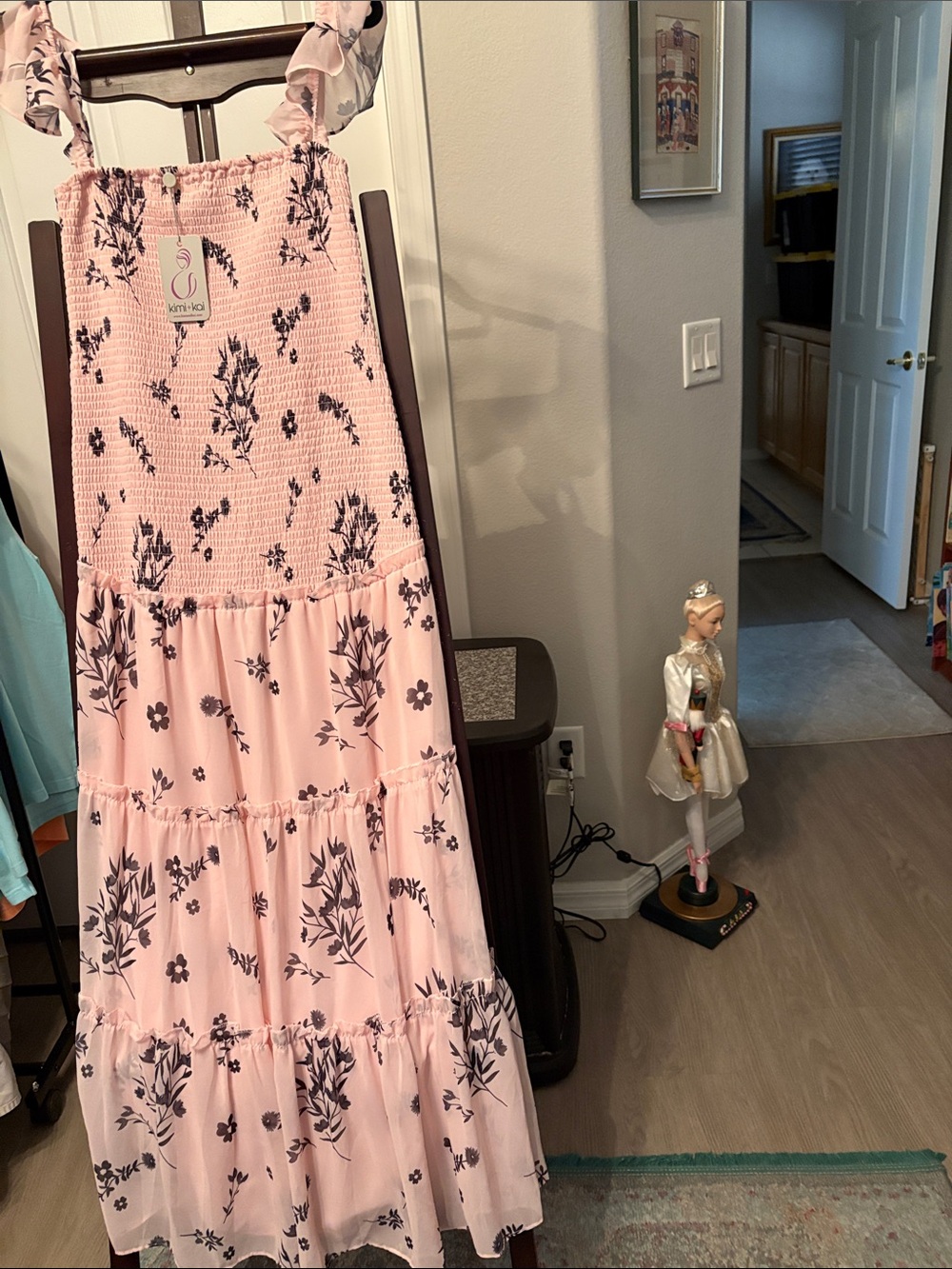 Maternity Pink Floral Tiered dress.
Daughter got  it in 3 sizes .Kept small